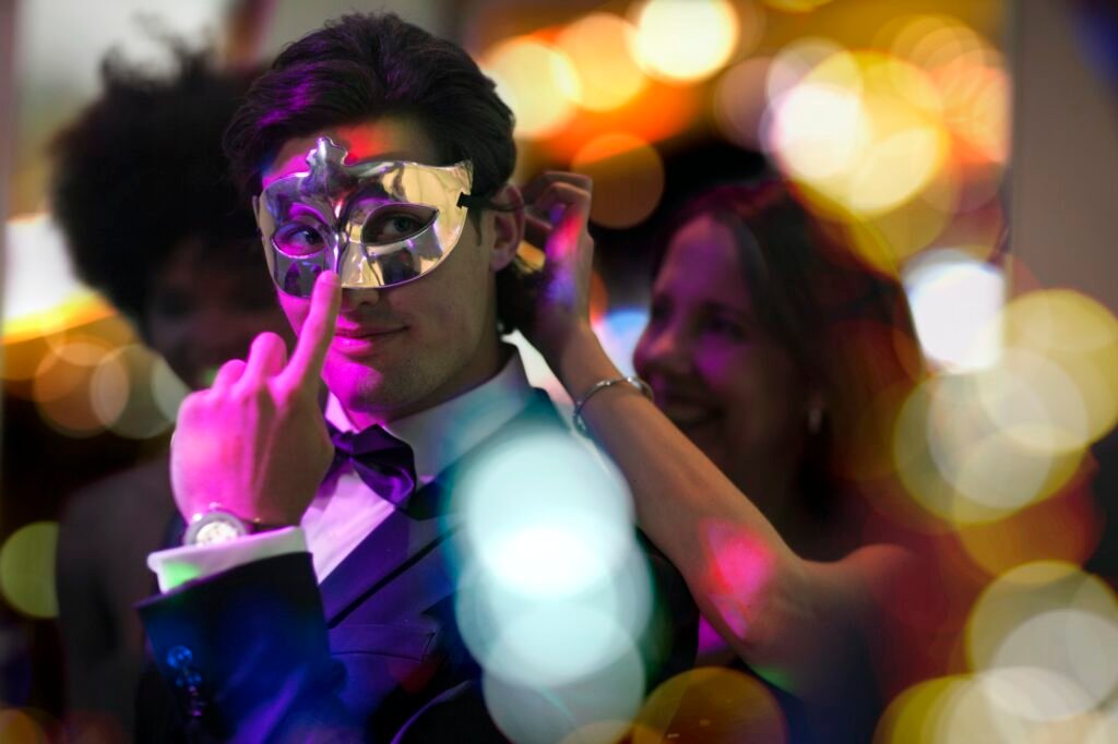 Man on a costume party wearing a mask